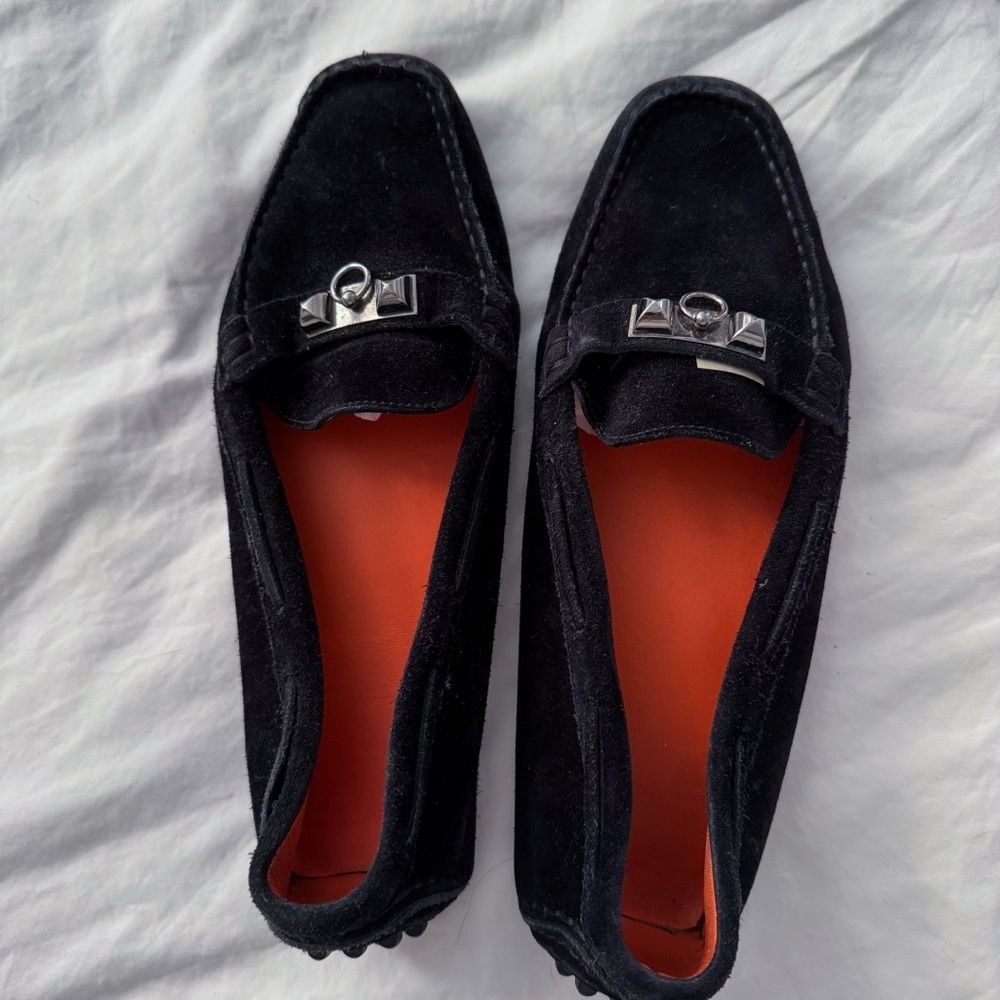 Classic black loafers with silver hardware